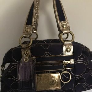 Purple and gold coach poppypurse